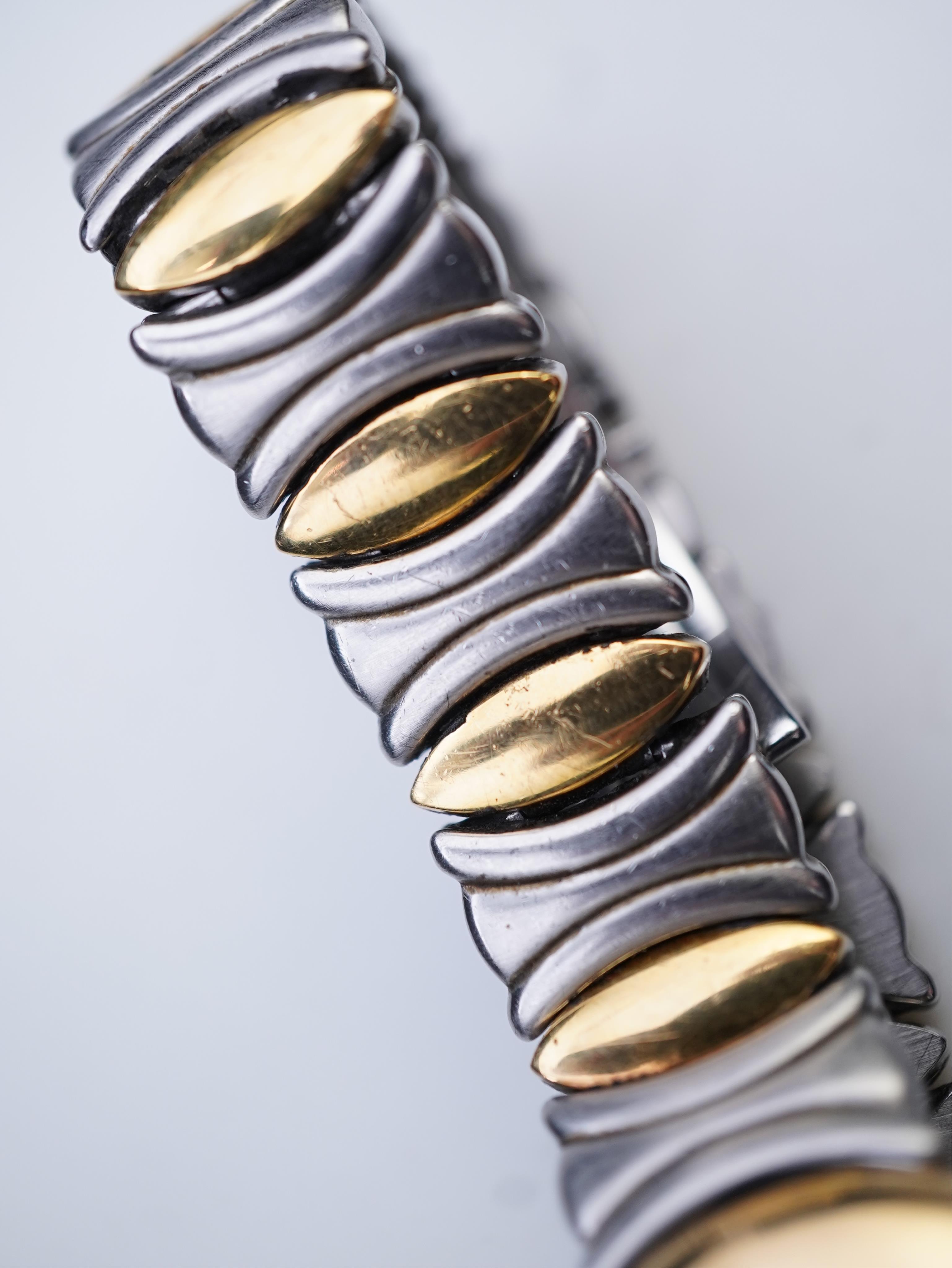 Cartier, a lady's gold and stainless steel wristwatch, 'Colisée', ref.8057908C